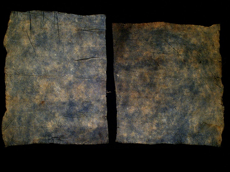 Barkcloth (tapa cloth), Solomon Islands. Oldman Collection. Gift of the New Zealand Government, 1992. Te Papa (OL002309/2) Two pieces of blue tapa cloth on a black background.