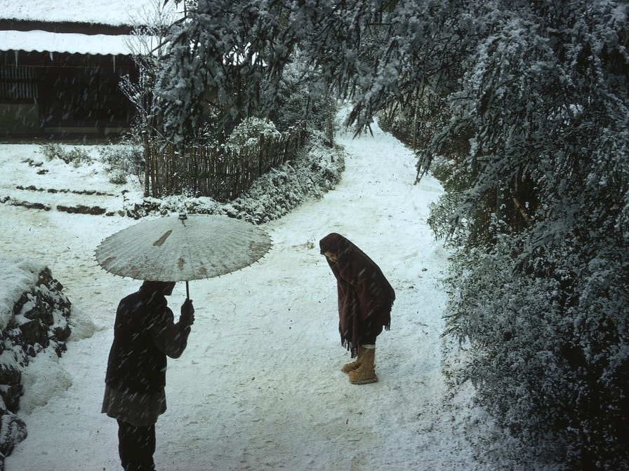 Japan series: Movie industries Two people meeting on a snowy pathway in Japan.