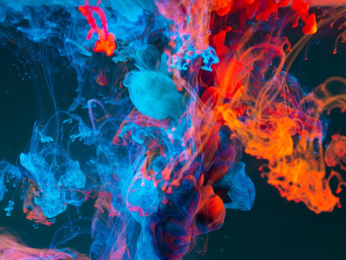 Blue and orange smoke, 2018. Photo by Lukas K / Unsplash Blue, red, and orange swirly smoke on a black background.