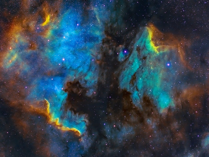 Aldebaran S. Photo by Aldebaran S on Unsplash A colourful photo of a star sky with rainbow colours on the clouds