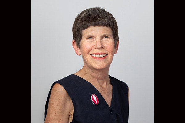 Head and shoulders of a woman with short hair.