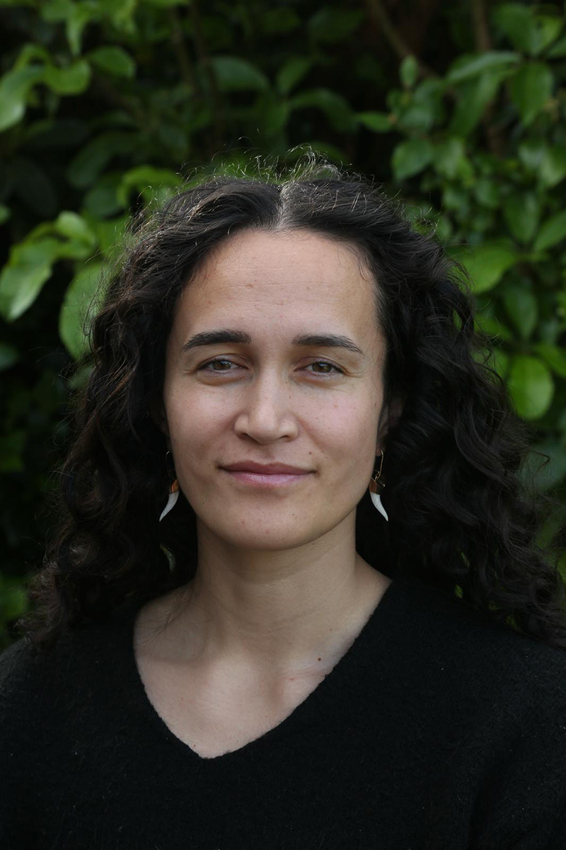 Head and shoulders of a woman looking at the camera.