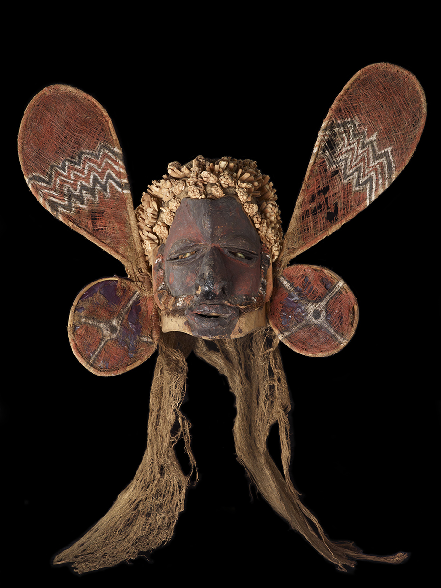 A mask that has round wings or loops with thread crisscrossed over them.
