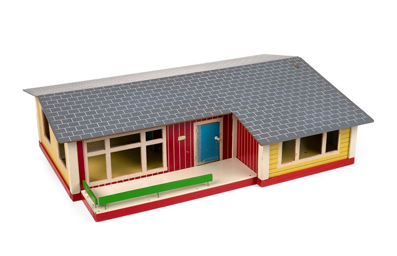 A replica of a one-storey house that is a doll's house.