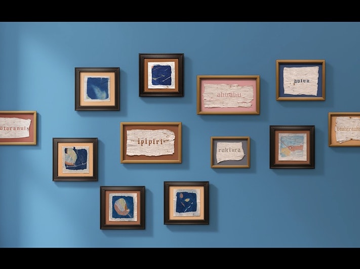 Still from Cora-Allan Lafaiki-Twiss video for Slow Burn, 2026 Twelve framed images on a blue wall.