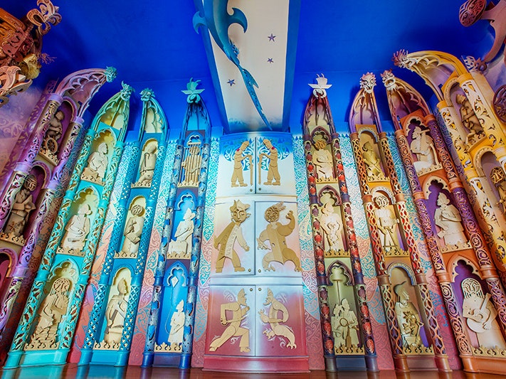Detail of Te Hono ki Hawaiki, 2015. Photograph by Norm Heke. Te Papa (79630) A colourful space with carved MDF panels and doors all different colours.