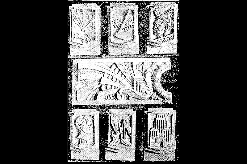 A grainy photo of carved stones in a group.