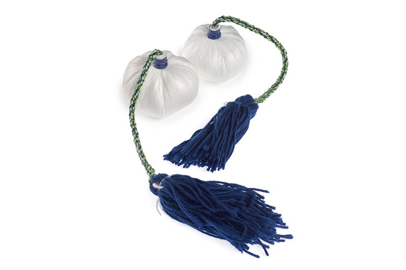 2 poi made from  wool, polyethylene and plastic. The ball (pōro) is plastic, the wool tassels (hukahuka) are dark blue. The braided cord (taura) is woven blue and green wool.