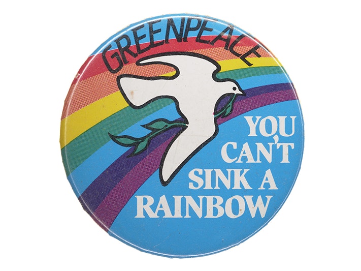 You Can't Sink A Rainbow badge, Greenpeace; creating agency; circa 1985; New Zealand. Gift of Ken Thomas, 2008. Te Papa (GH011822) A badge with a dove on a rainbow with the words "Greenpeace. You can't sink a rainbow"
