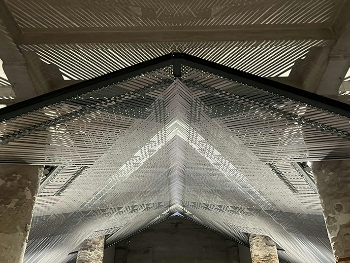 Mataaho Collective, Takapau on display at the Venice Biennale 2024. Photo courtesy of Mataaho Collective A close-up photo of the large-scale weaving installation in the Venice gallery.