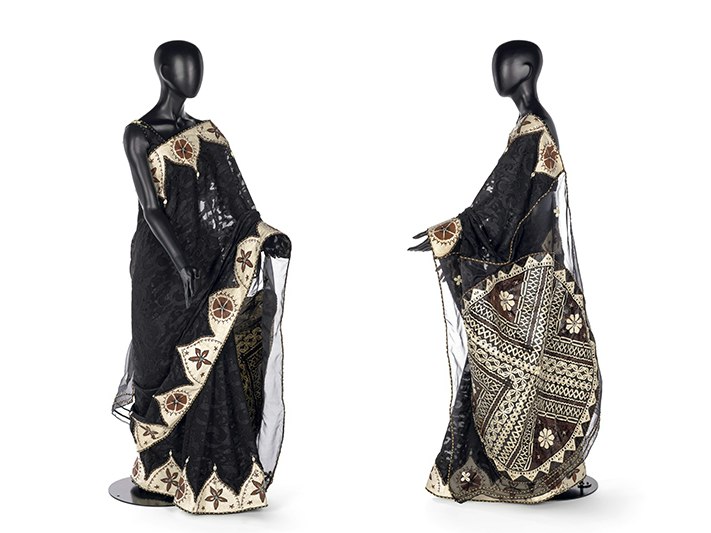 Sari; 2005; Nirmala Balram, Fijian Indian; masi (tapa), silk, shells. Te Papa (FE012618) Frot and side views of a black mannequin wearing a sari made with silk, shells, and tapa cloth.
